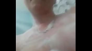 Mom with big tits showering and pussy