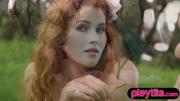Slender redhead european milf flaunts her naked figure in a forest