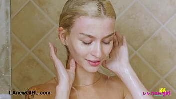 Elegant blonde enjoys a sensual bath