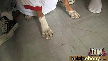 Huge cocks cover their black face in cum 14