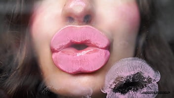 Sensual creamy pink lipgloss kiss