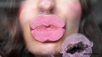 Sensual creamy pink lipgloss kiss