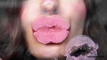 Sensual creamy pink lipgloss kiss