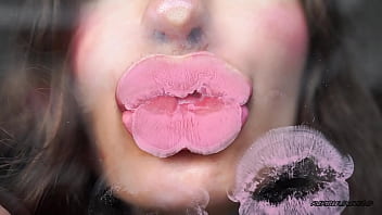 Sensual creamy pink lipgloss kiss