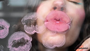 Sensual creamy pink lipgloss kiss