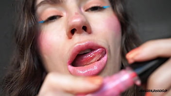 Sensual creamy pink lipgloss kiss