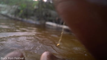 Skinny dark skinned african hottie teasing in the water