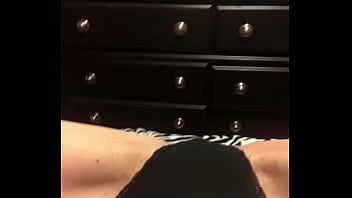 Milf plays with herself while hubby is sleeping