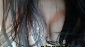 Huge tits brunette milf in front of cam