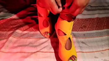 She's too hot to handle and she wants to tease you even more making herself a sexy foot massage