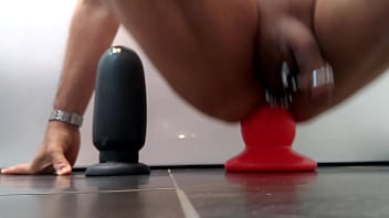 Huge butt plugs deep in ass