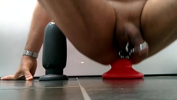 Huge butt plugs deep in ass