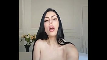 Horny brunette putting her favorite toy in her pussy while moaning