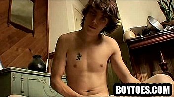 Horny Hunk Tugging His Cock And Showing Off His Feet thumbnail