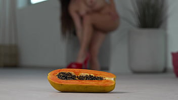 Petite girl crushes fruits with high heels hot footfetish