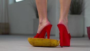 Petite girl crushes fruits with high heels hot footfetish