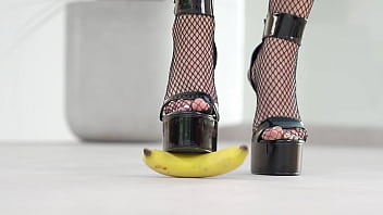 Petite girl crushes fruits with high heels hot footfetish