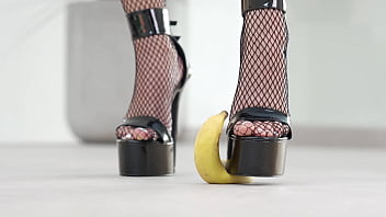 Petite girl crushes fruits with high heels hot footfetish