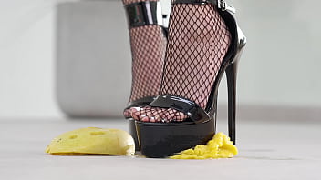 Petite girl crushes fruits with high heels hot footfetish