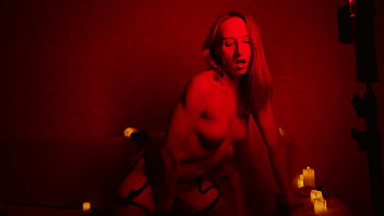 Naked beautiful witch between firing candles