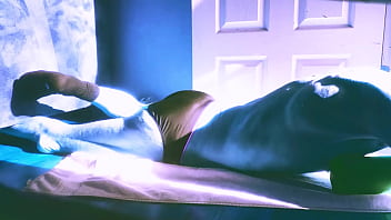 Sped up stretching on floor with roller and briefs for some sun and relief in winter december 2021