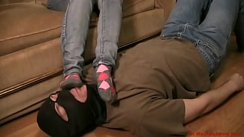 Kitty socked footstool1 at my neighbors feet