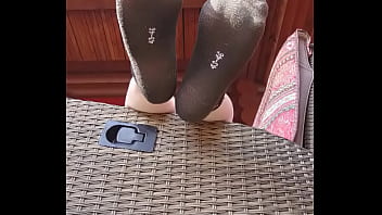 Schwarze Socken Auf Der Veranda thumbnail