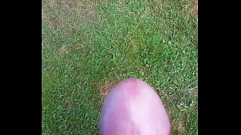 Cumming in the grass