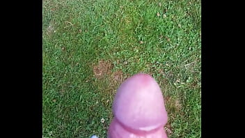 Cumming in the grass
