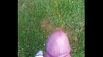 Cumming in the grass