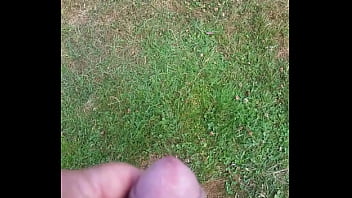 Cumming in the grass