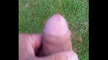 Cumming in the grass
