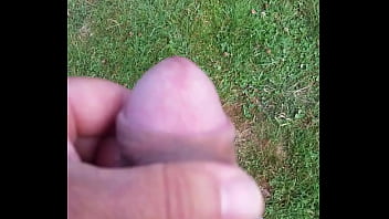 Cumming in the grass