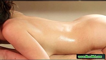 Busty japanese masseuse gives oilde massage 11