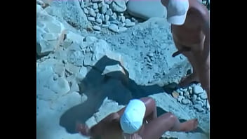 Amateur tan milf fucking on the rocks