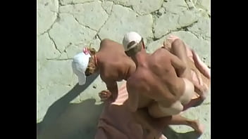 Amateur tan milf fucking on the rocks