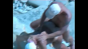 Amateur tan milf fucking on the rocks