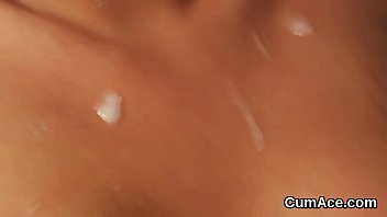 Flirty babe gets cumshot on her face sucking all the cum