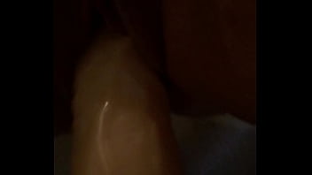 Pounding her with huge dildo