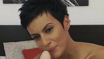 Sexy girl on webcam sucking dildo