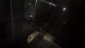Horny brunette swallows my cock in a hotel bathroom