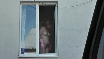 Nude Woman Neighbor Sexy Mature Milf Without Panties And Bra Washes Windows Her Apartment A Taxi Driver Watches From Car Solo Naked In Public Peeping Outdoor Outside Publicly Big Natural Tits Pussy thumbnail
