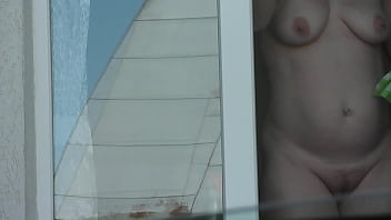 Nude woman neighbor sexy mature milf without panties and bra washes windows her apartment a taxi driver watches from car solo naked in public peeping outdoor outside publicly big natural tits pussy Nude woman neighbor sexy mature milf without panties and bra washes windows her apartment a taxi driver watches from car solo naked in public peeping outdoor outside publicly big natural tits pussy