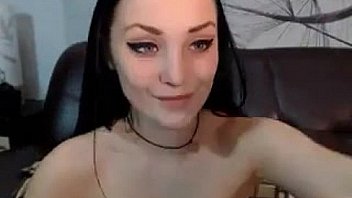 Tattooed teen girl with a toy