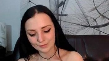 Tattooed teen girl with a toy