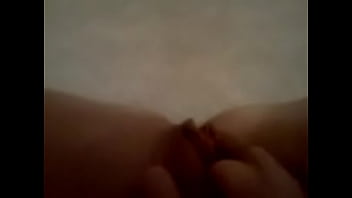 Latina rubbing pussy