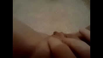 Latina rubbing pussy