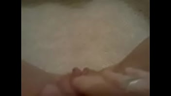 Latina rubbing pussy