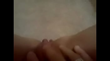 Latina rubbing pussy