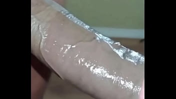 Slut swallowing a big black dick deep down her throat